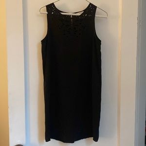 Sleek black silk shift dress from Joie with eyelets